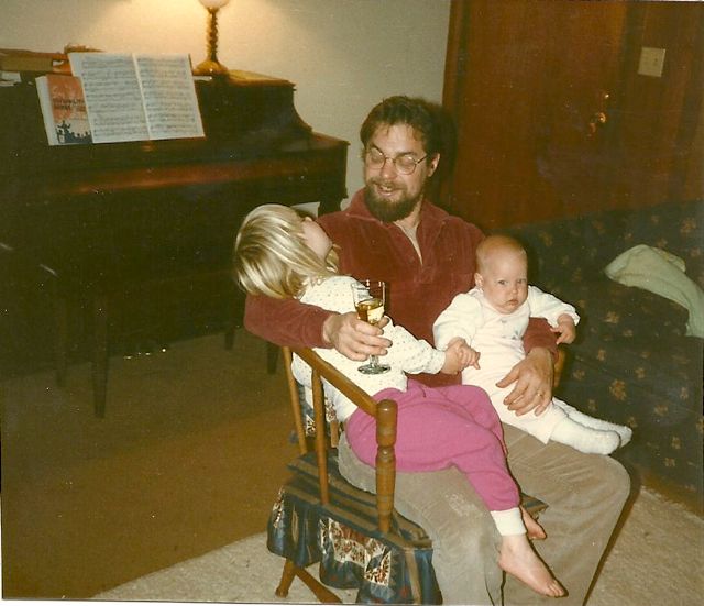 1985-both girls in Dad's lap